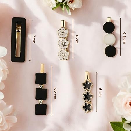 Shop a stylish set of 5 black, white and gold decorative hair clips featuring floral, bow and geometric designs. Trendy hair accessories for women and girls.