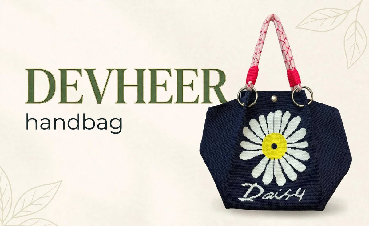 Navy blue knitted tote handbag with large white yellow daisy flower and pink rope handle for women