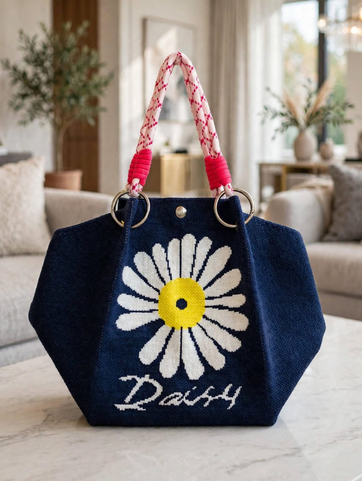 Navy blue knitted tote handbag with large white yellow daisy flower and pink rope handle for women