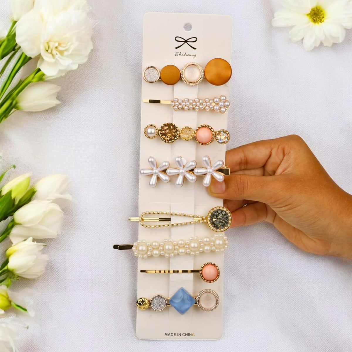 Shop elegant pearl, floral and crystal-style hair clips for women and girls. Multicolor gold-tone decorative barrettes for parties, weddings and everyday styling.