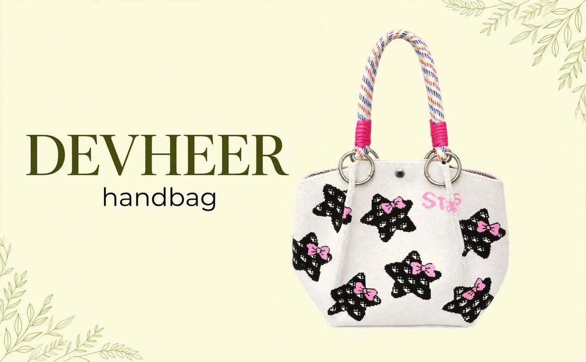 Women’s white printed tote handbag with black stars pink bows and rope handle
